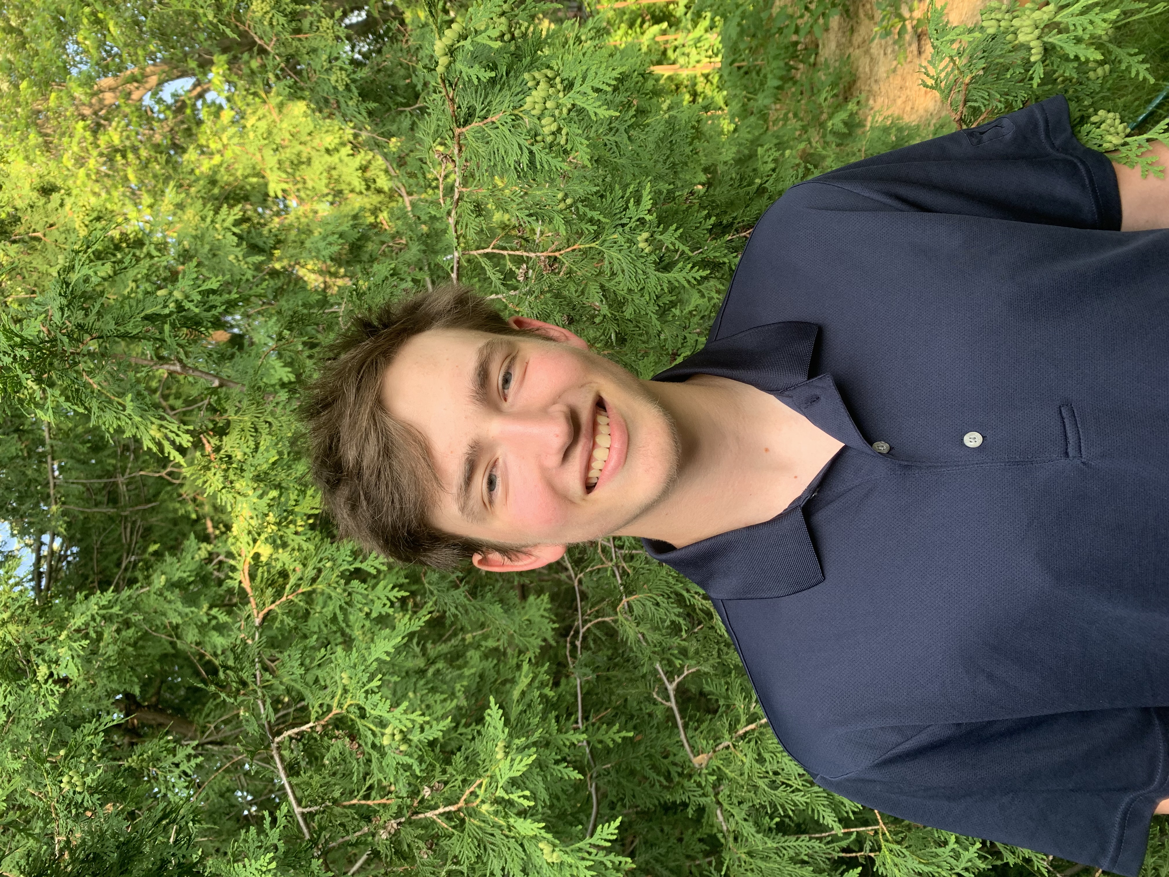 Mike Stefan standing in front of a tree